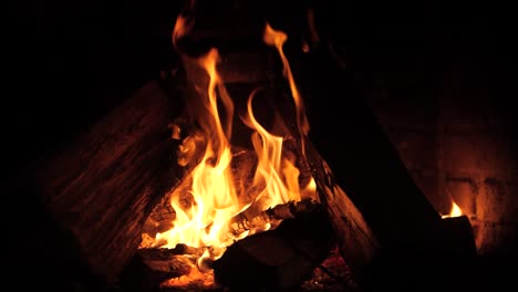 Mesmerizing-Super-Slow-Motion-View-of-an-Open-Fireplace,-Unveiling-the-Delicate-Dance-of-Flames-in-an-Intimate-Display-of-Cozy-Ambiance-and-Sublime-Hearth-Magic
