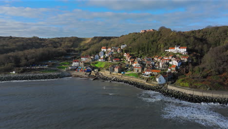 Wide-Angle-Drone-Shot-of-Runswick-Bay-on-Sunny-Winter-Day-Yorkshire-UK