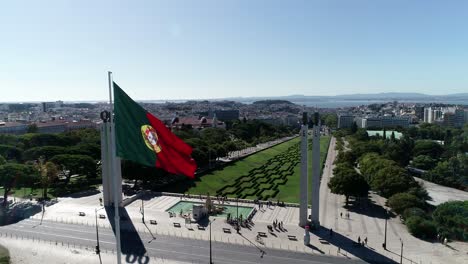 Portugal-national-flag-waving-in-Lisbon,-Portugal