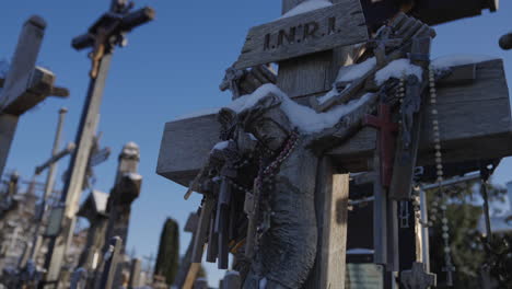 close-up-of-wooden-and-metal-Christian-crosses-with-the-I