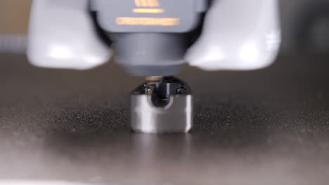 Close-up-static-shot-of-object-being-printed-on-3D-printer