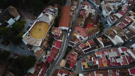 Narrow-streets-and-beautiful-architecture-of-Mijas-city,-aerial-view