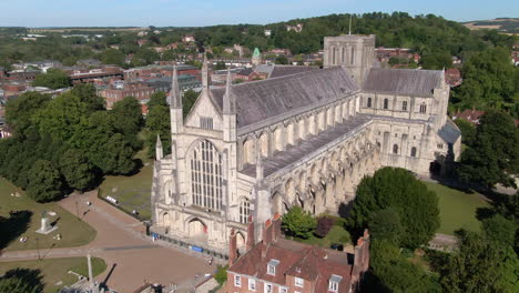 Drone-shot-of-Winchester-Cathedral-captured-in-Summer-in-Hampshire,-UK