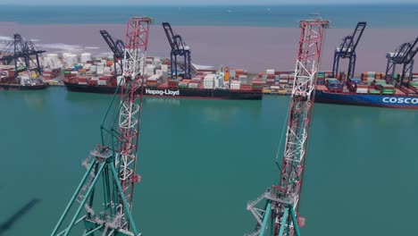 Aerial-Flying-Past-Cranes-At-San-Antonio-Port-In-Chile