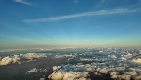 Winter-sky-at-sunset,-as-seen-by-the-pilots-of-an-airplane-flying-over-Mallorca-Island,-Spain,-4000m-high