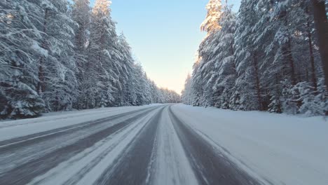 POV-Tense-winter-driving-commute-on-ice-and-snow-highway-Finland-climate