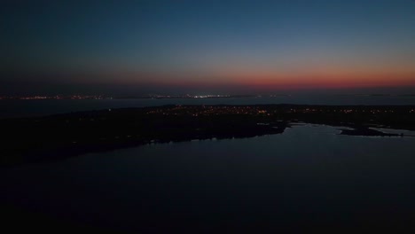 Drone-shot-showing-island-of-Kinmen-金門-in-Taiwan-during-golden-sunset-with-dark