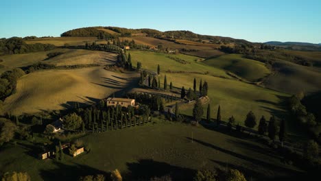 Panoramic-aerial-overview-of-picturesque-majestic-green-Tuscan-landscape