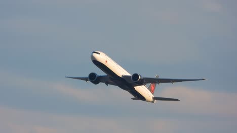 Air-Canada-passenger-airplane-in-sky-after-take-off,-tracking-shot