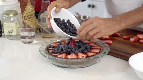 Adding-blueberries-to-homemade-dairy-free-vegan-plant-based-cheesecake-diet-healthy-eating
