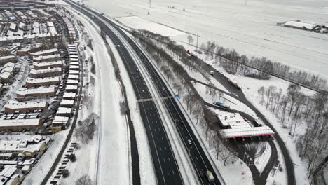 Aerial-View-Snow-landscape-and-highway-A1-at-Amersfoort,-The-Netherlands