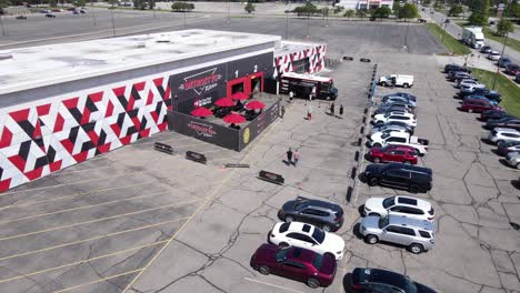 Detroit-75-food-truck-and-massive-parking-lot,-aerial-view