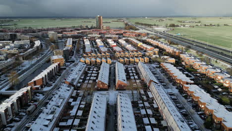 Snow-and-winter-aerial-view-at-Amersfoort-Nieuwland,-The-Netherlands