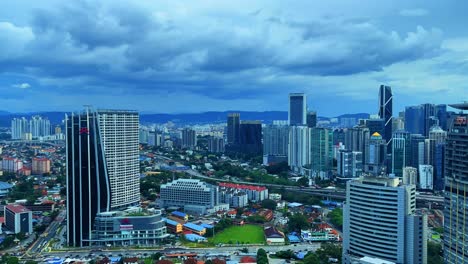 Time-lapse-Kuala-Lumpur-megacity-in-Asia,-Malaysia-time-passing-transition