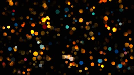 Animation-of-small-round-blue-and-orange-particles-in-bokeh