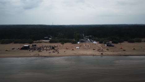 Aerial-drone-view-of-a-party-in-sea-beatch