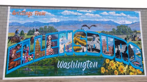 Beautiful,-colorful-and-artistic-mural-on-brick-wall-of-cultural-traditions-in-downtown-city-of-Ellensburg,-Washington,-USA