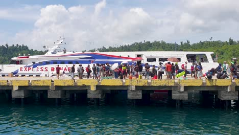 Crowds-of-people-on-busy-wharf-traveling-from-Sorong,-New-Guinea-to-Waisai,-Raja-Ampat,-West-Papua,-Indonesia