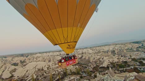 Hot-Air-Balloons-In-Flight-At-Dawn-Over-Cappadocia-In-Turkey