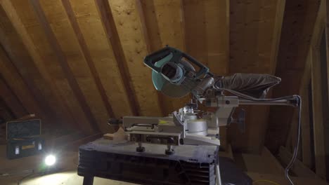 Makita-Mitre-Saw-On-A-Construction-Site,-Isolated-Power-Tool