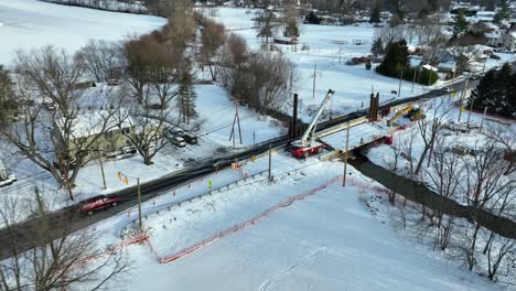 Bridge-replacement-repair-during-winter-snow-scene