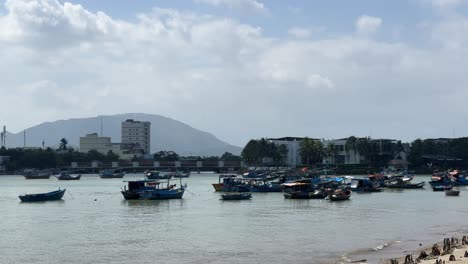 Serene-view-of-boats-mooring-in-Cai-River,-Nha-Trang,-Vietnam