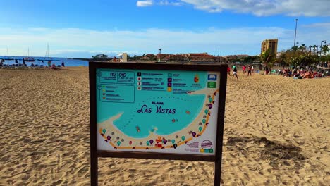 Playa-de-las-Vistas-sign-in-Tenerife-Canary-Islands-Spain,-perfect-weather-for-sun-bath