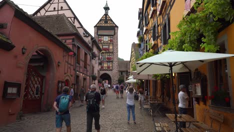 Fortified-gateway-to-the-town-has-a-25-meter-high-belfry-offering-a-bellicose-face-to-outside-and-a-benevolent-aspect-inside-Riquewihr-village