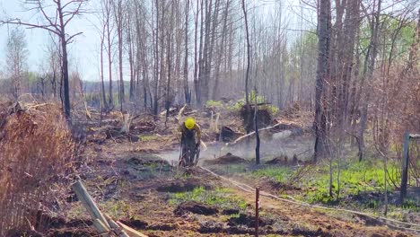 Brave-Firefighters-Dragging-Heavy-Hoses-Out-of-Wildfire-Danger-Zone