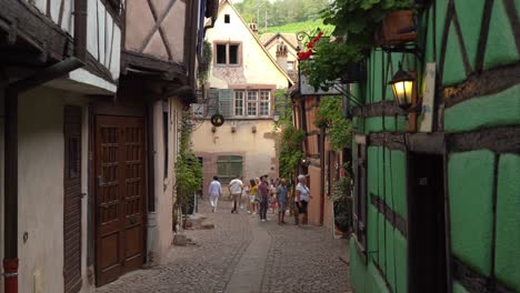 Riquewihr-half-timbered-homes-are-quintessential-Germany,-while-the-wrought-iron-details-and-flowing-French-wine-let-you-know-you-are-in-France