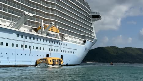 Royal-Caribbean,-Spectrum-of-the-Seas-cruise-ship-docked,-and-picturesque-scenic-landscapes-of-Nha-Trang,-Vietnam
