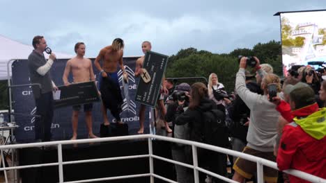 Winners-of-the-2019-Death-Diving-Championship-celebrate-on-the-winner's-podium