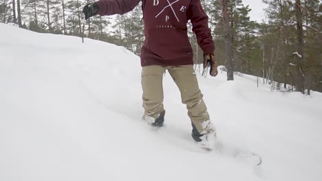 Snowboarder-rides-powder-on-mountain---Slow-motion