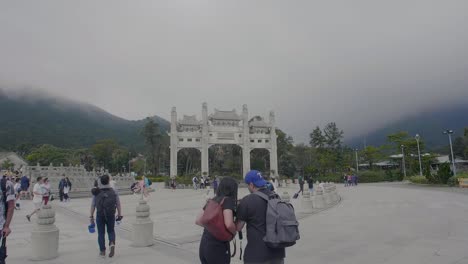 Ngong-Ping-Village-main-plaza-as-tourists-and-visitors-take-pictures-and-walk-round-during-an-overcast-day