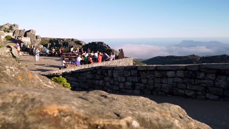 Tourists-mingle-on-the-lookout-deck-on-top-of-Table-Mountain-in-South-Africa