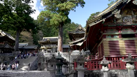 A-rotational-scene-unfolds,-moving-from-right-to-left,-showcasing-the-temples-of-Shimojinko,-Shinyosha,-and-Kagura-den-in-Nikko,-Japan