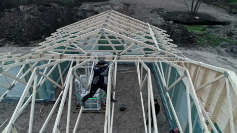 Setting-up-the-wooden-trusses-when-building-a-roof-on-a-house