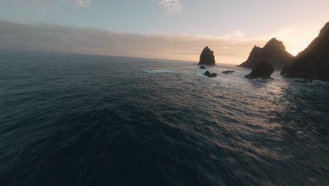 Proximity-FPV-drone-flight-over-the-ocean-at-Ponta-Do-Rosto,-Madeira