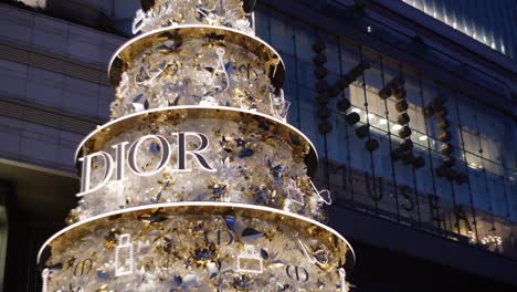 Illuminated-Amazing-giant-Dior-Christmas-Tree-decoration-at-K11-Musea,-Hong-Kong