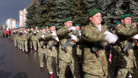 Military-Parade---Soldiers-In-Camouflage-Uniform-Marching-In-Sync-During-The-Great-Union-Day-In-Miercurea-Ciuc,-Romania