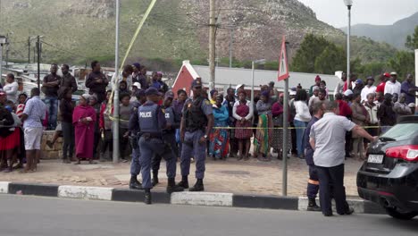 Wide-shot-SAPS-Police-block-bystanders-from-entering-township-crime-scene