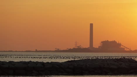Silhouette-Of-Power-Plant-Industry-In-Map-Ta-Phut-Industrial-Estate-At-Sunset-In-Rayong,-Thailand