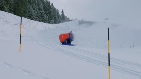 A-snow-cannon-shoots-snow-on-the-slope