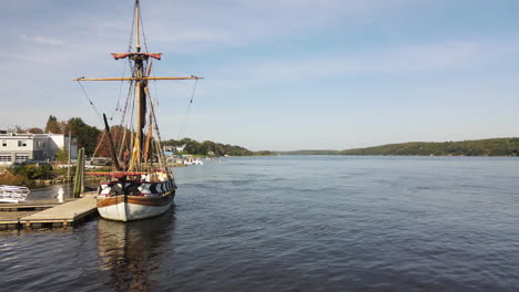 Aerial-low-level-push-forward-shot-of-the-Pinnace-Virginia-boat-on-the-River-Kennebec