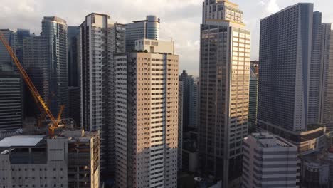 Drone-shot-of-Makati-City-Skyline,-Philippines