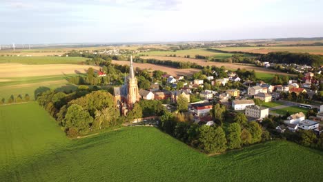 Opava-District,-Czech-Republic---The-Church-of-Jana-Krtitele-in-Sudice-Village---Orbit-Drone-Shot