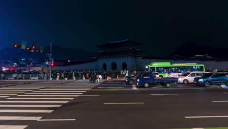 Seoul-Light-Gwanghwamun-Festival---Artistic-Lights-Projection-on-Gwanghwamun-Gate-at-Night,-People-and-Traffic-Time-Lapse
