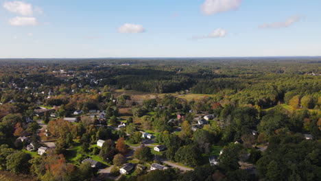 Static-aerial-footage-of-the-Fall-Foliage-of-the-countryside-in-Bath,-Maine