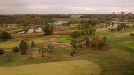 Aerial-of-Forest-Park-golf-course-with-the-Saint-Louis-Art-Museum-on-the-horizon-on-a-pretty-day-in-Autumn