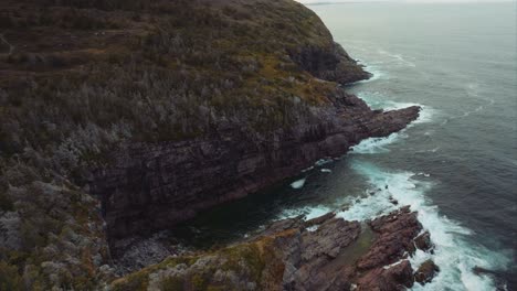 Rugged-coastline-of-Eastern-Canada-with-powerful-waves-crashing-against-the-rocky-shore